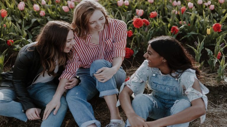 group of females smiling and laughing